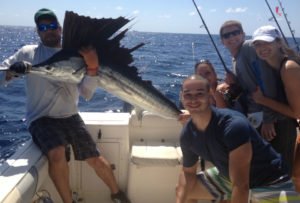 Depicting a corporate group enjoying a drift fishing charter in Miami